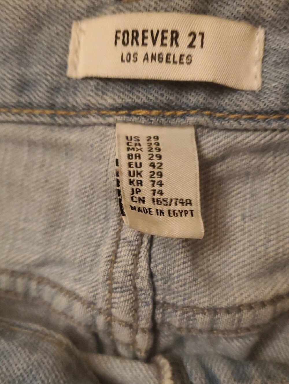 Light Wash Distressed Ripped Jeans - Picture 2 of 9